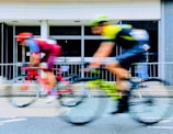 time lapse photography of two bikers