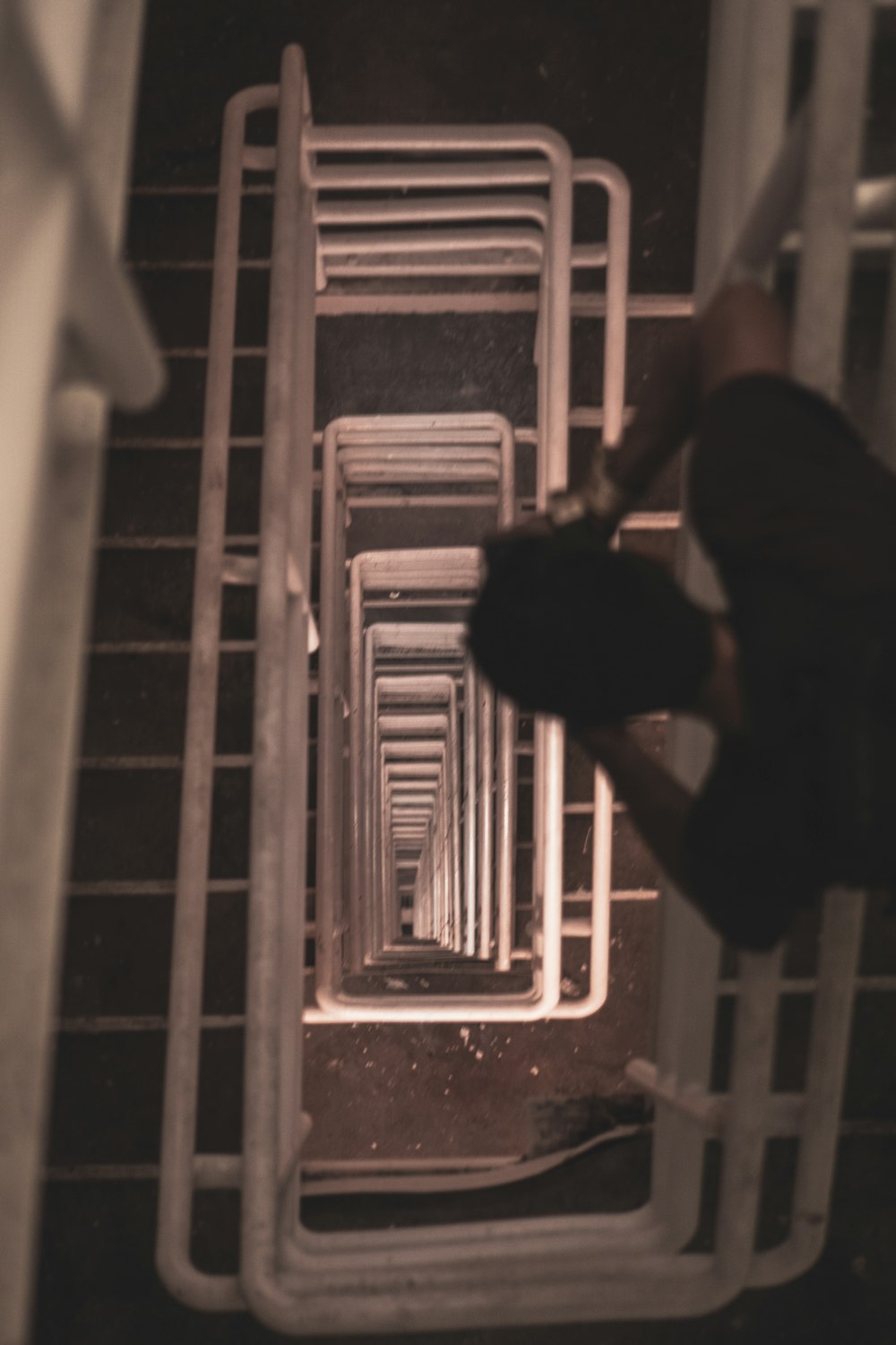 architectural photography of spiral stairs