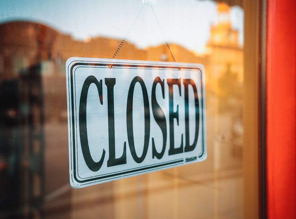 selective focus photography of Closed signage