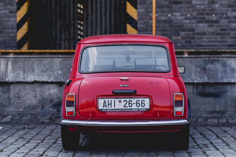 red car parked on parking space