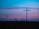 cross stand under purple and blue sky