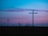 cross stand under purple and blue sky