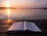 book on top of table and body of water