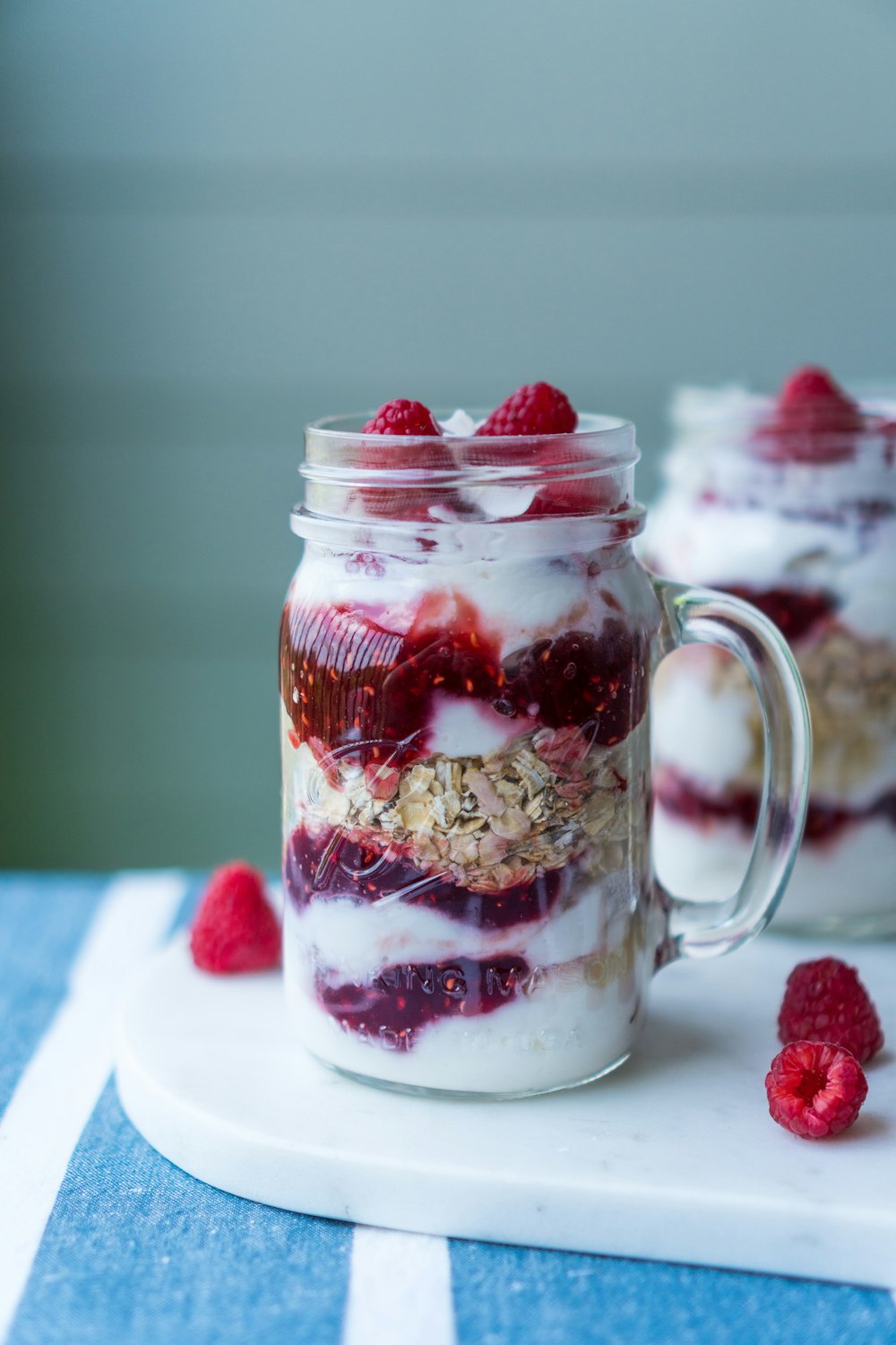 two strawberry shakes on table