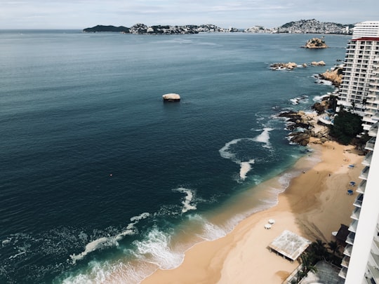 brown sandy beach aerial photo in Acapulco Mexico