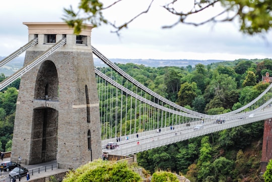 grey concrete bridge with people crossing in Clifton Down United Kingdom