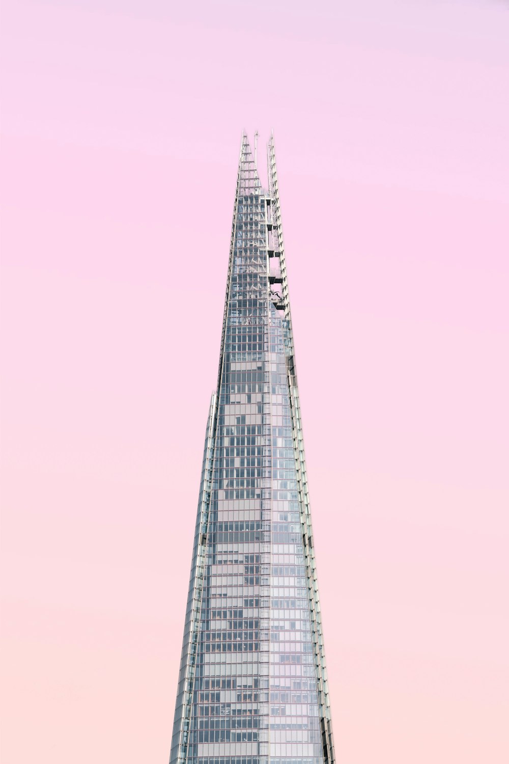 gray concrete tower under cloudy sky