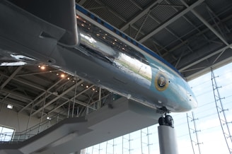 Showcase of aerospace components and connection elements displayed in a modern exhibition space.