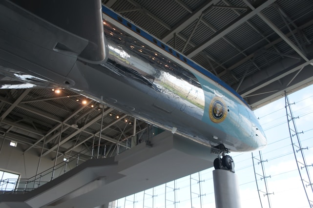 Showcase of aerospace components and connection elements displayed in a modern exhibition space.