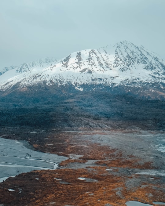 mountain coated with snow in Knik Glacier United States