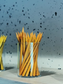 pencils in clear glass organizer