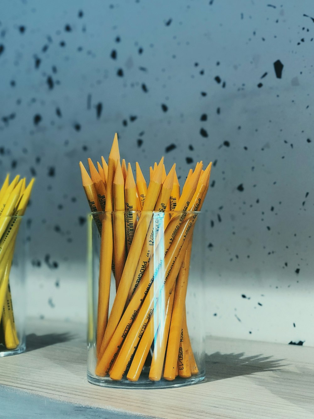 pencils in clear glass organizer