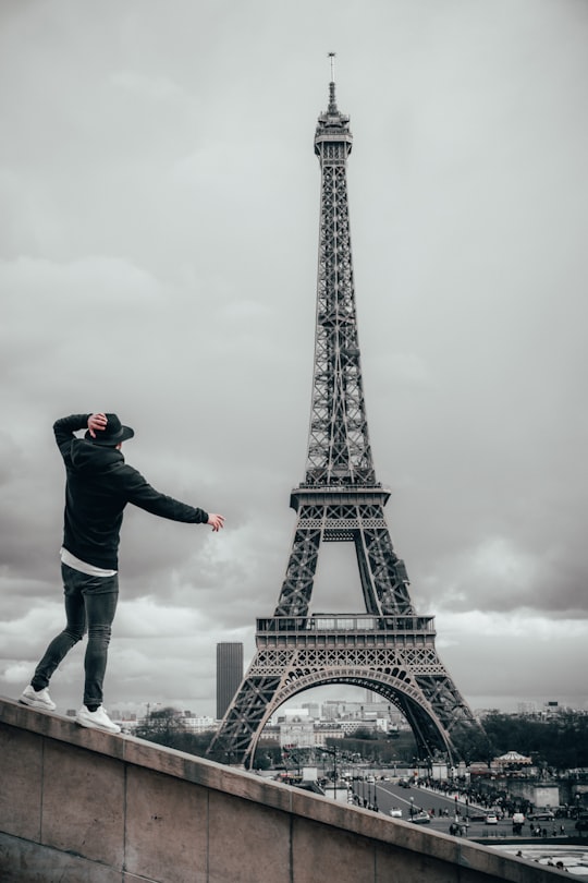 man beside Eiffel Tower in Trocadéro Gardens France
