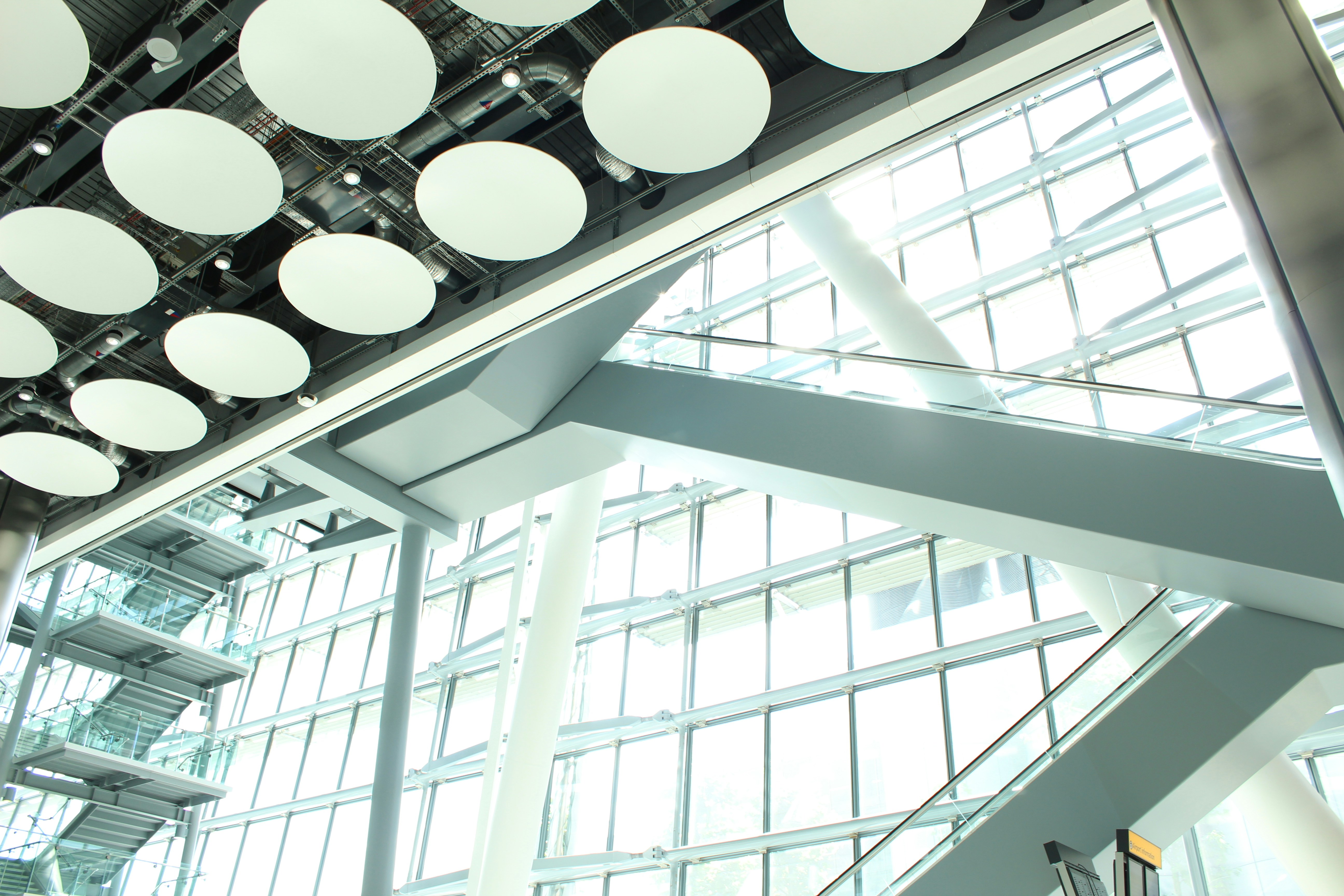 the ceiling of a large building with lots of windows, Terminal 5 Heathrow