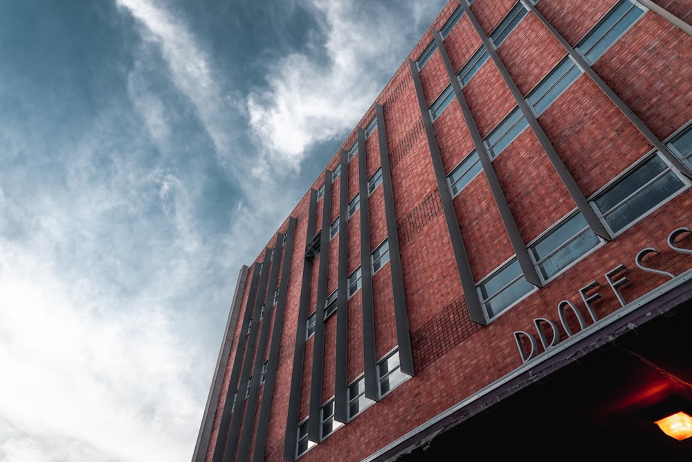 worms eye view of concrete building during daytime