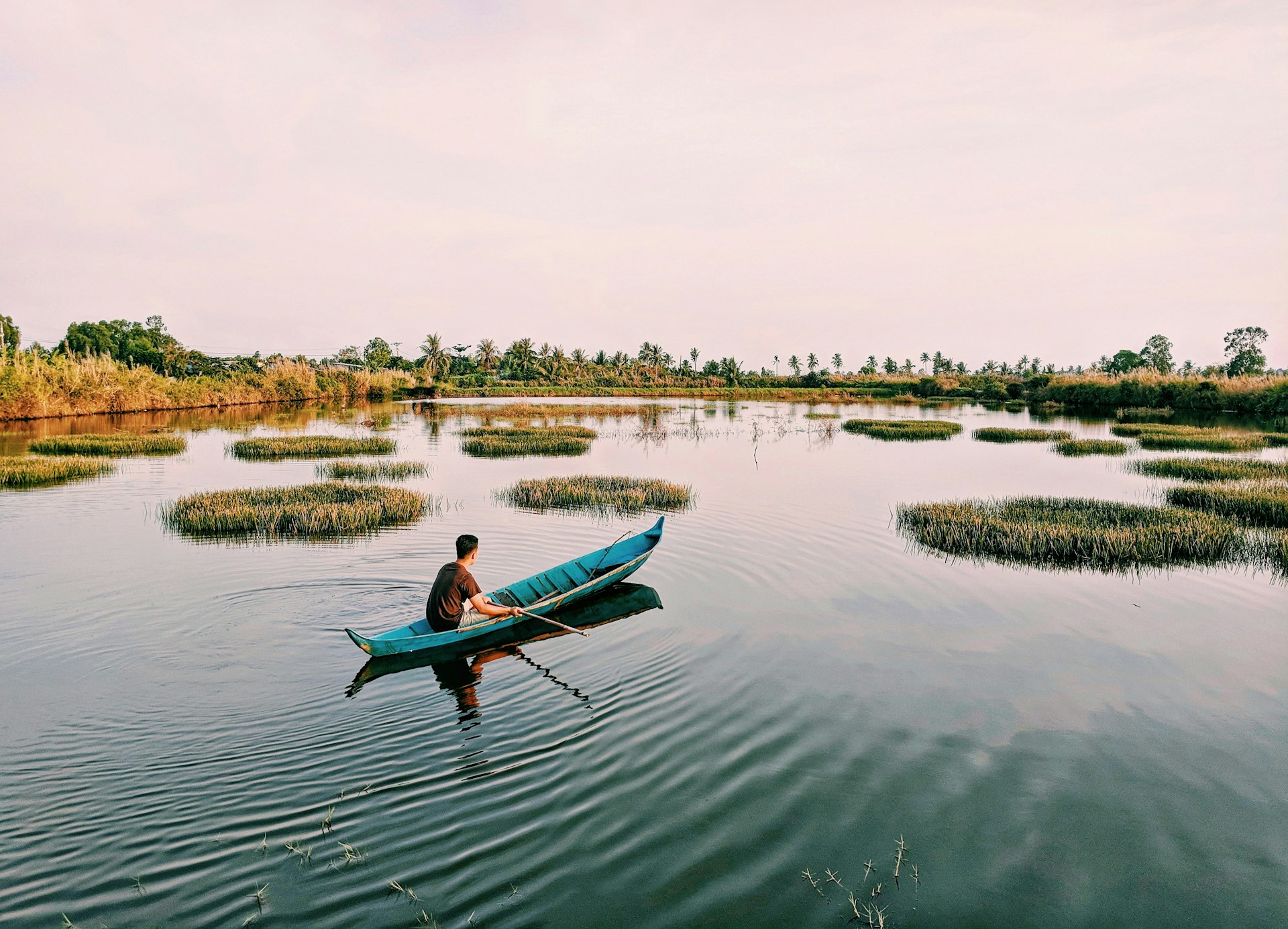 man sailing on body of water