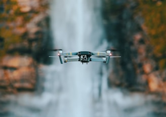 selective focus photography of quadcopter drone