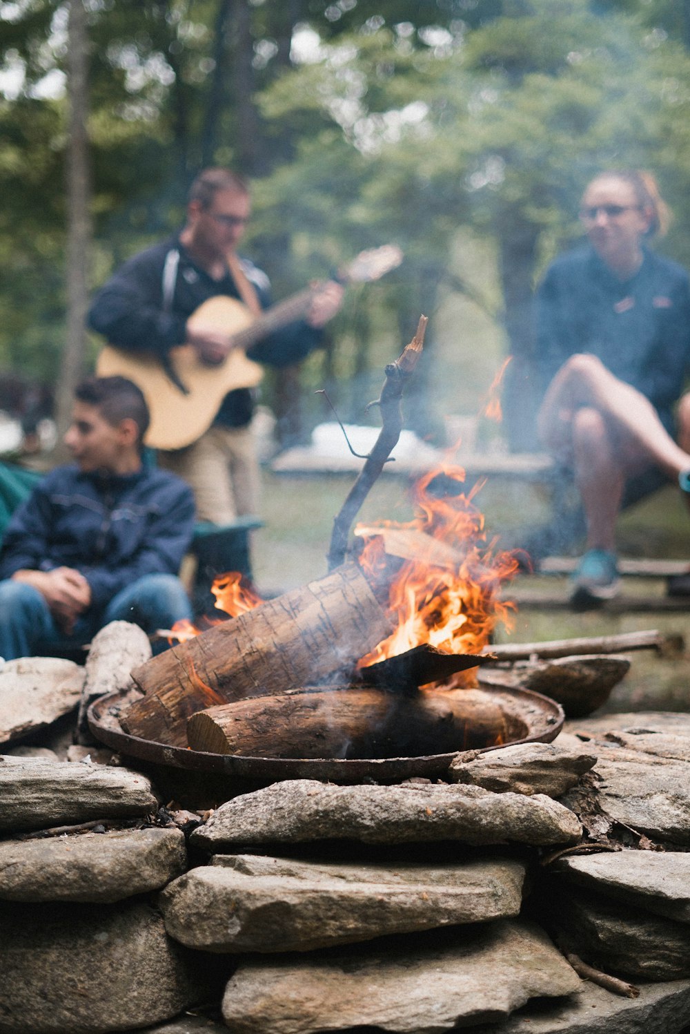 selective focus photography of fire on wood