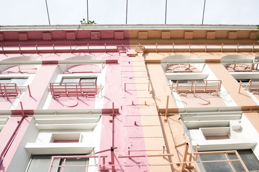 pink and orange painted building