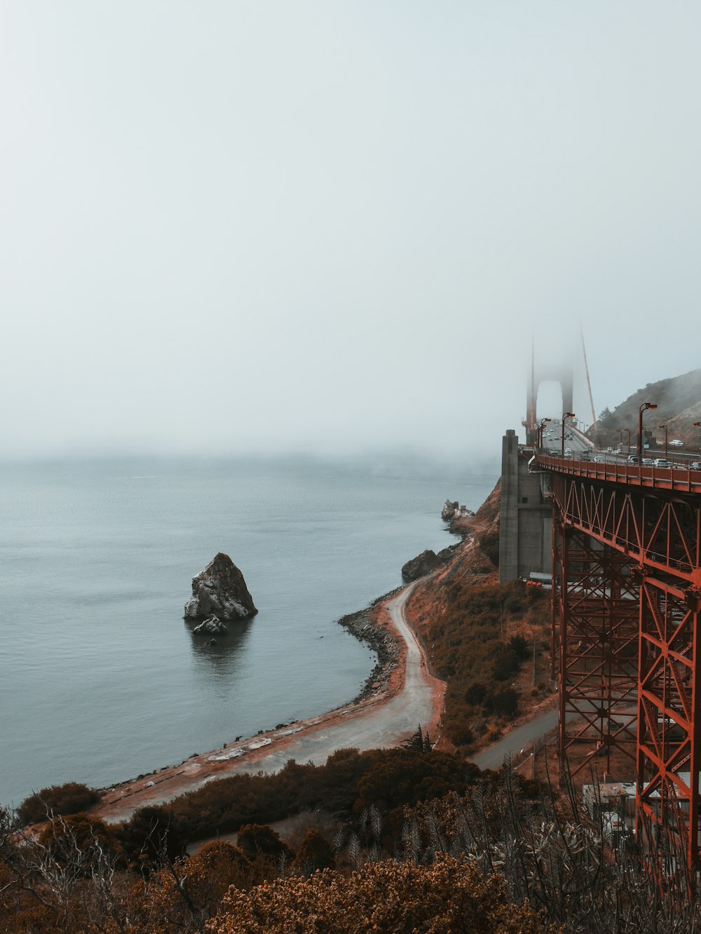 road beside body of water