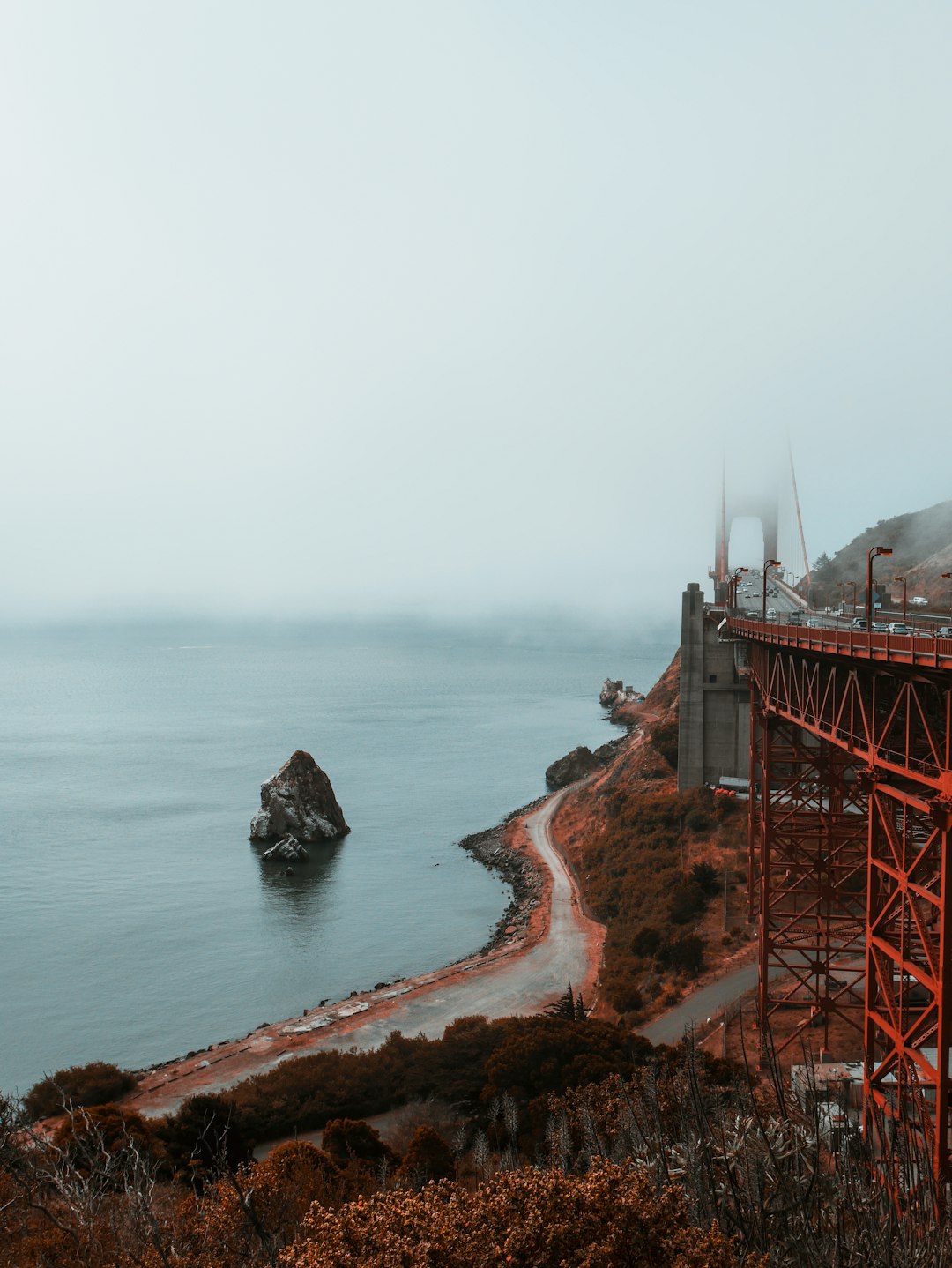 road beside body of water