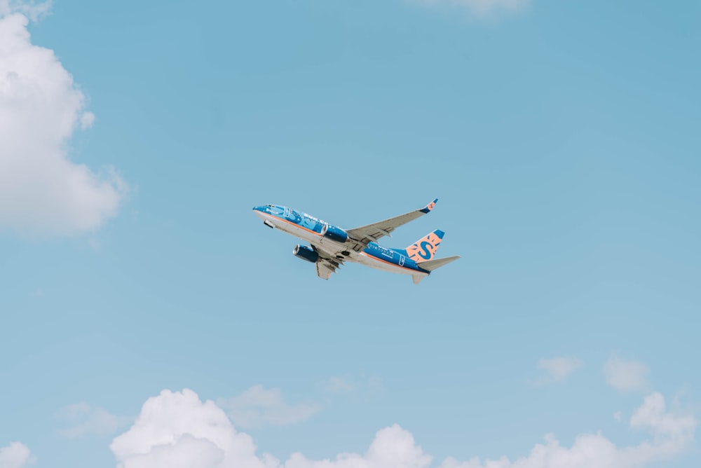 blue and white airplane