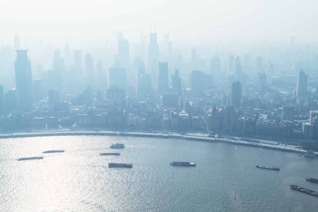 aerial photo of buildings near body of water