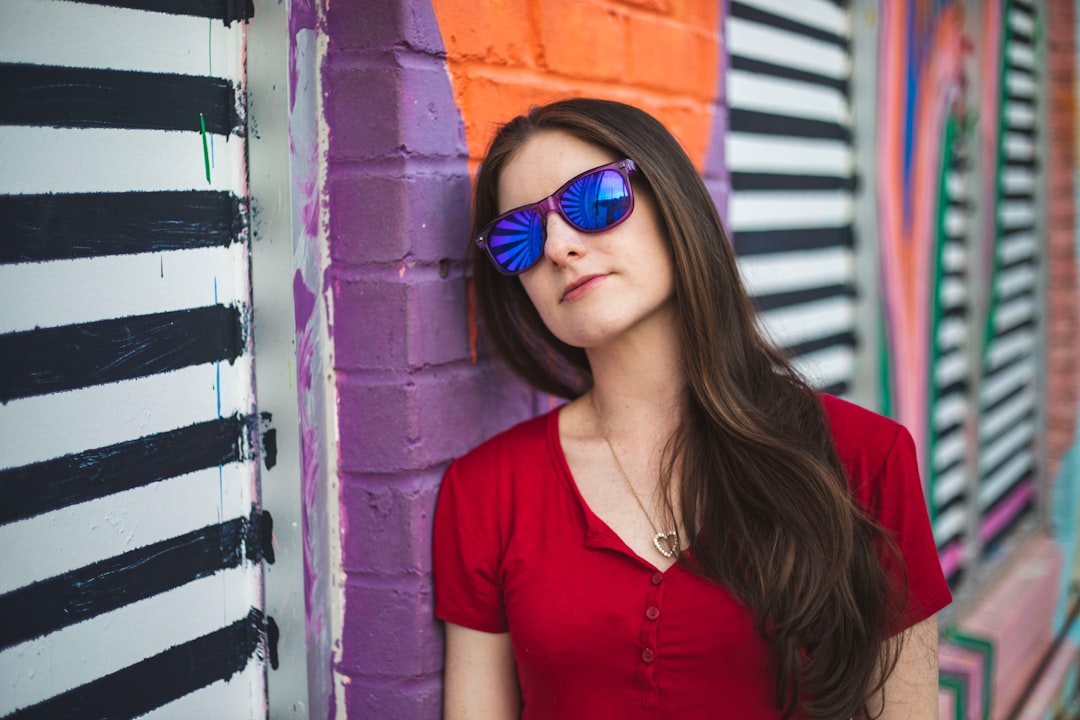 woman leaning on wall