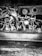 A collection of various keys and lock hardware is arranged on a dark surface. The word 'FAMILY' is spelled out using some of the keys. The image is in black and white, giving it a vintage and industrial feel.