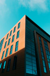 Modern architectural blueprint with orange and black design accents