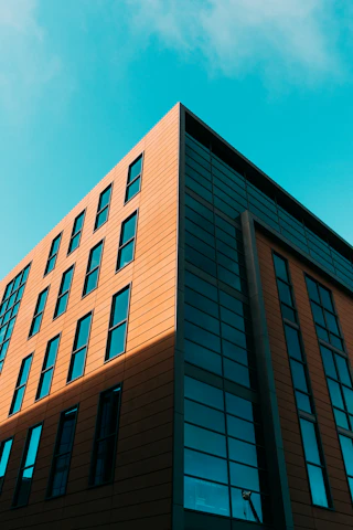 Modern architectural blueprint with orange and black design accents