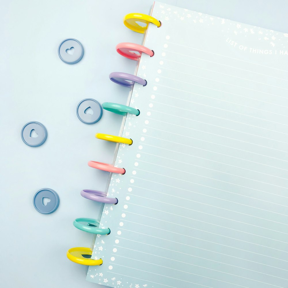 white ruled paper with assorted rings