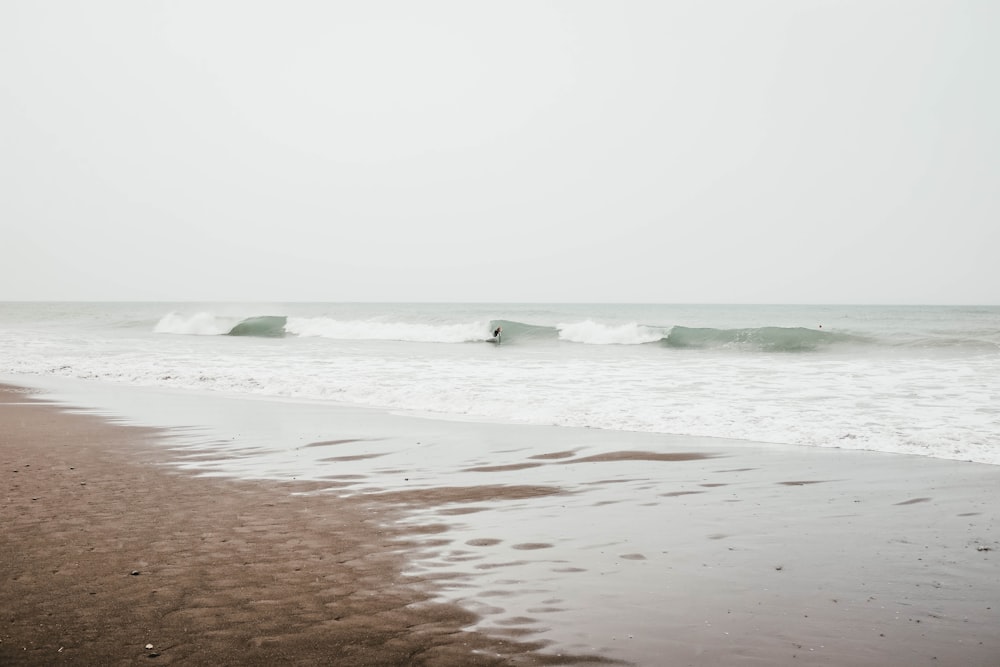 person surfing on waves