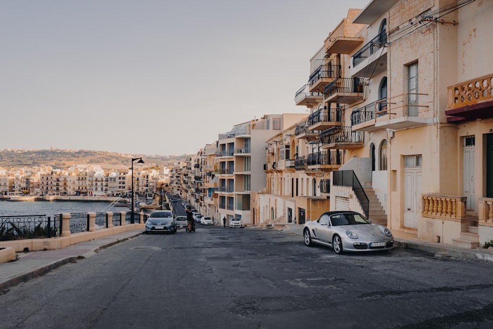 parked car near buildings taken during daytime