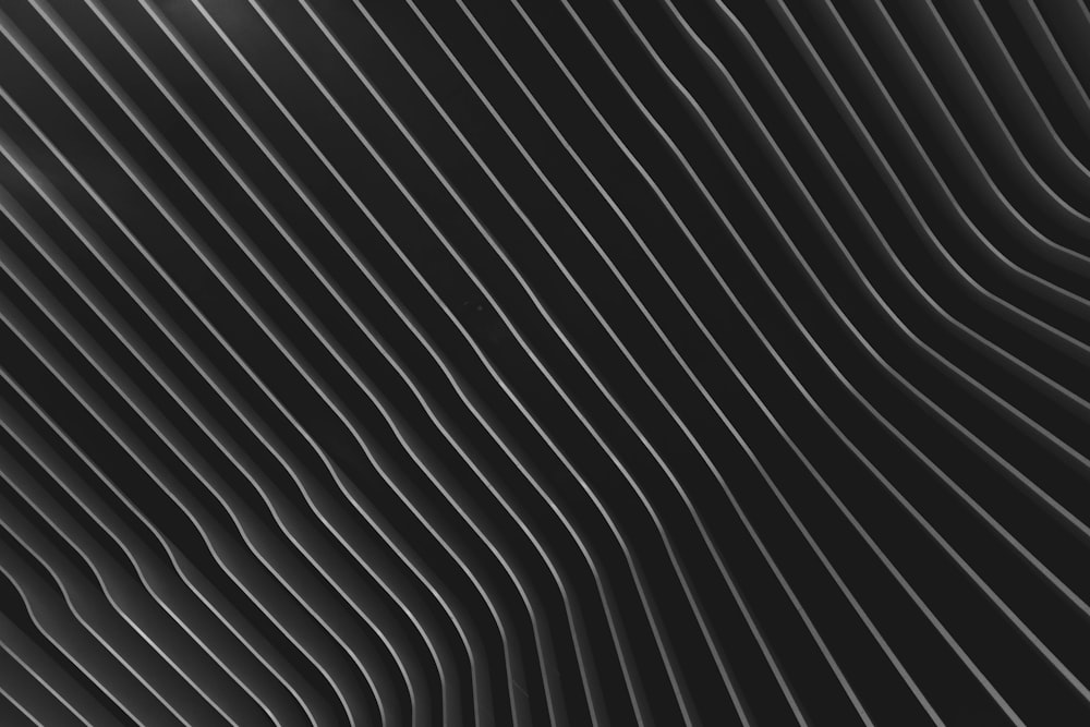 Un fondo abstracto en blanco y negro con líneas onduladas