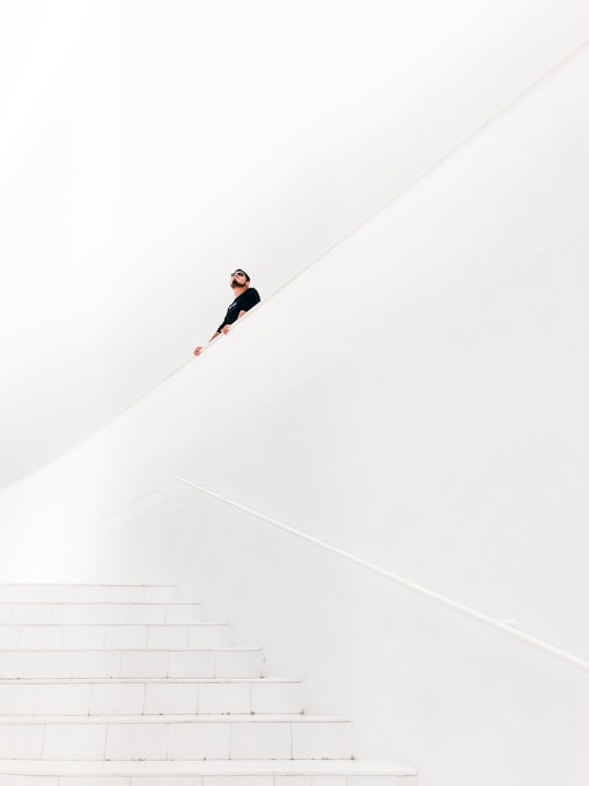 man looking up near stairs in Mexico City Mexico