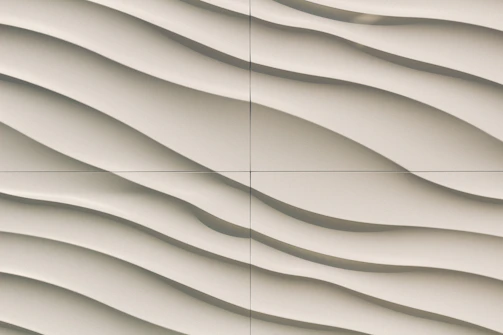 Close-up of textured wall design with premium patterns adding depth to a corporate meeting room.