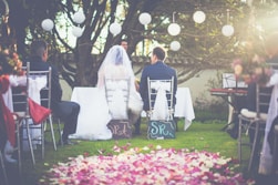 bride and groom having wedding ceremony