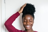 woman touching her hair