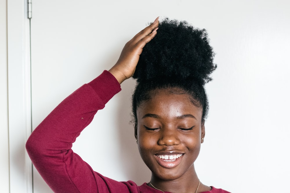 woman touching her hair