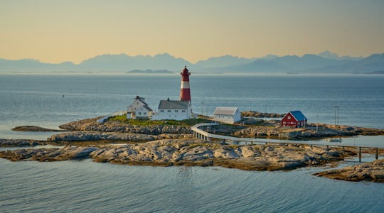 aerial photography of watch tower in the islet in Tranøy Fyr Norway