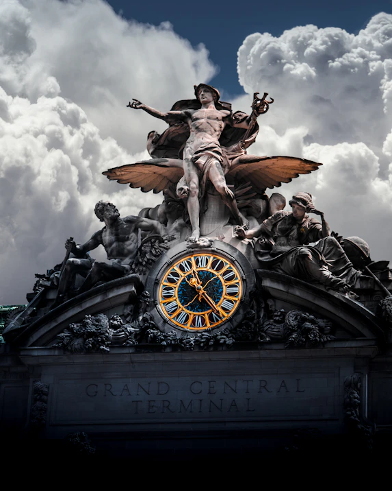 selective color photo of Grand Central Terminal statue