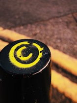 a close up of a yellow and black object