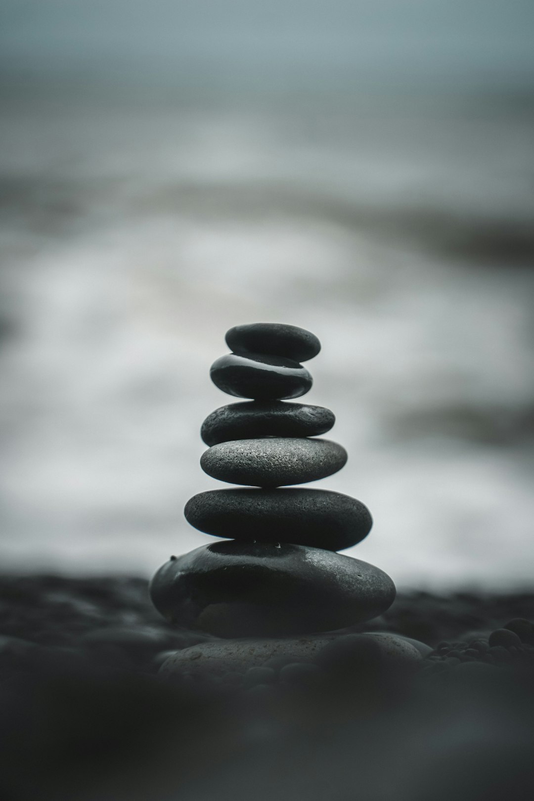  selective focus photography of pile of decorative stones weighing balance