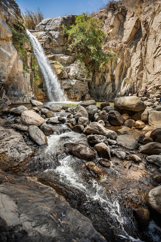 waterfalls surrounded by rock formation in Moro District Peru