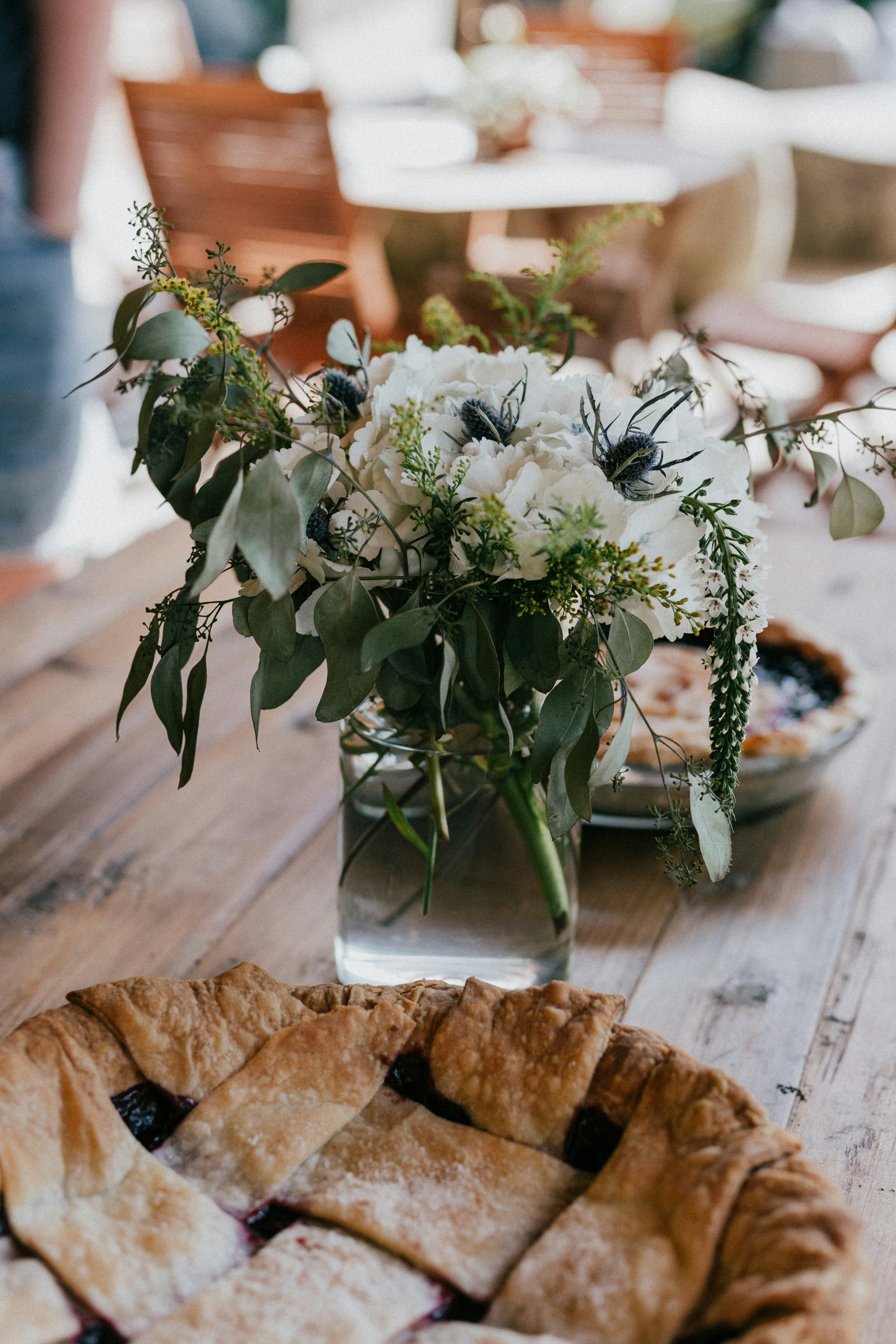 selective focus photography of blueberry pie on table