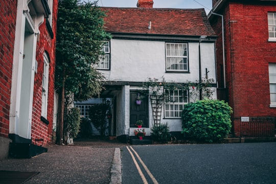 long-angle photo of white and red 2-storey concrete house in Manningtree United Kingdom