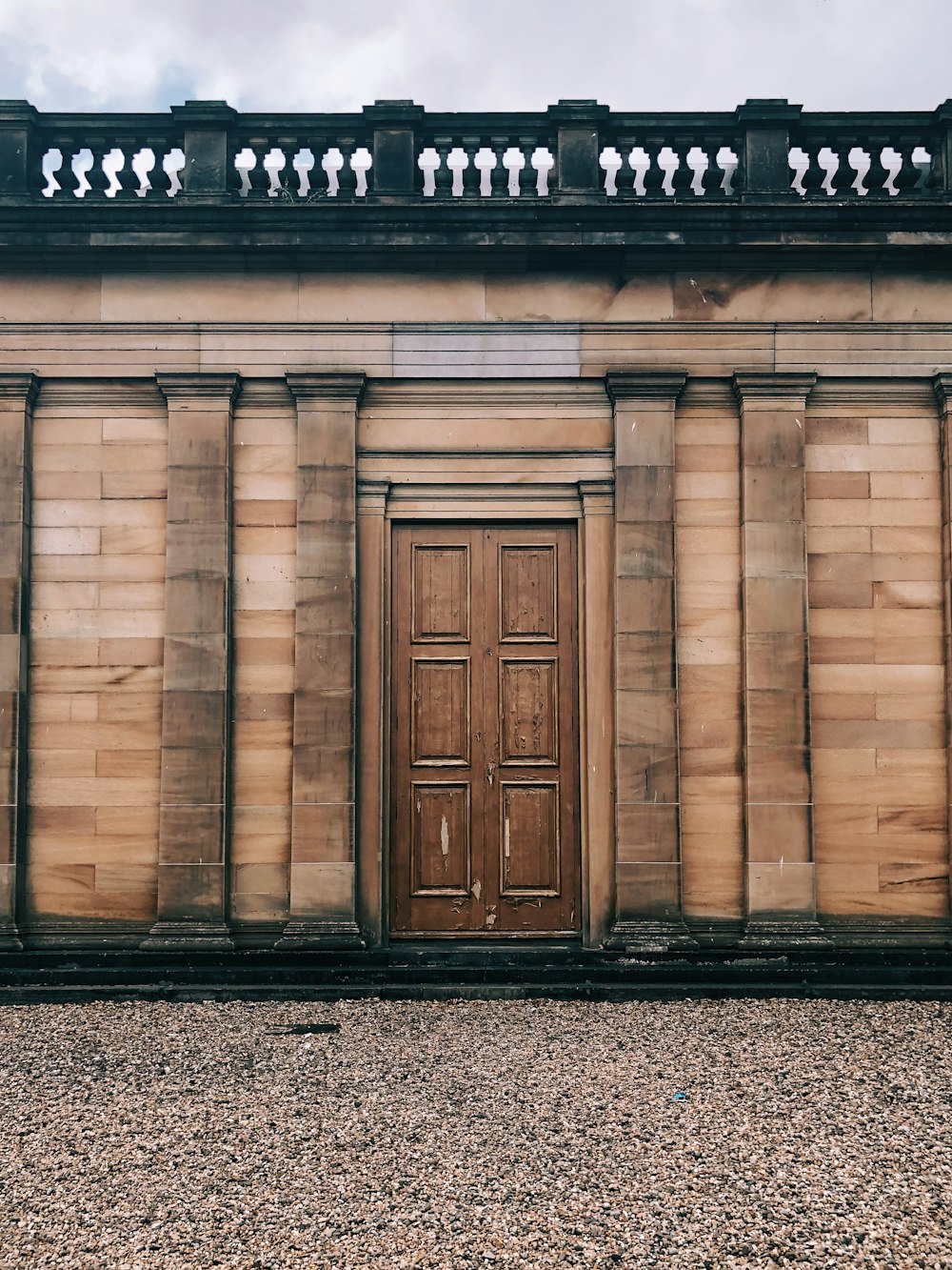 closed brown wooden door