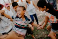 children playing on grass field