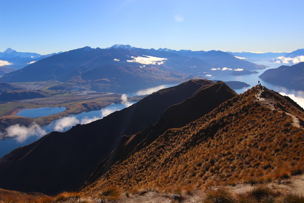 brown mountains under blue sky